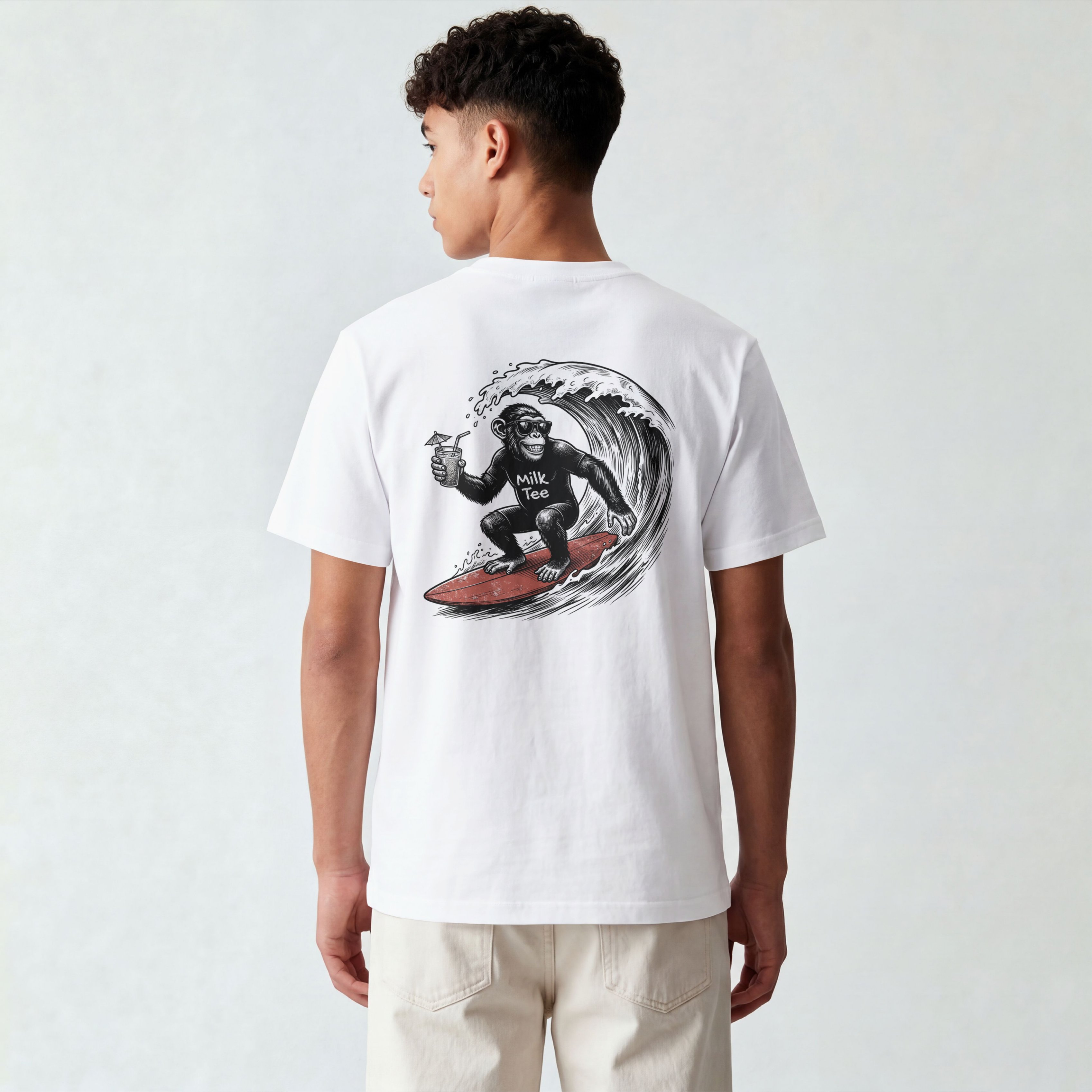 Cool surfing monkey chimpanzee wearing sunglasses back print graphic tee by Milk Tee