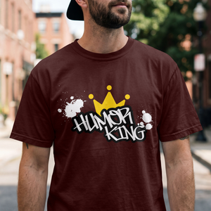 Model wearing a maroon premium cotton t-shirt with a bold white Humor King graffiti font and yellow crown graphic