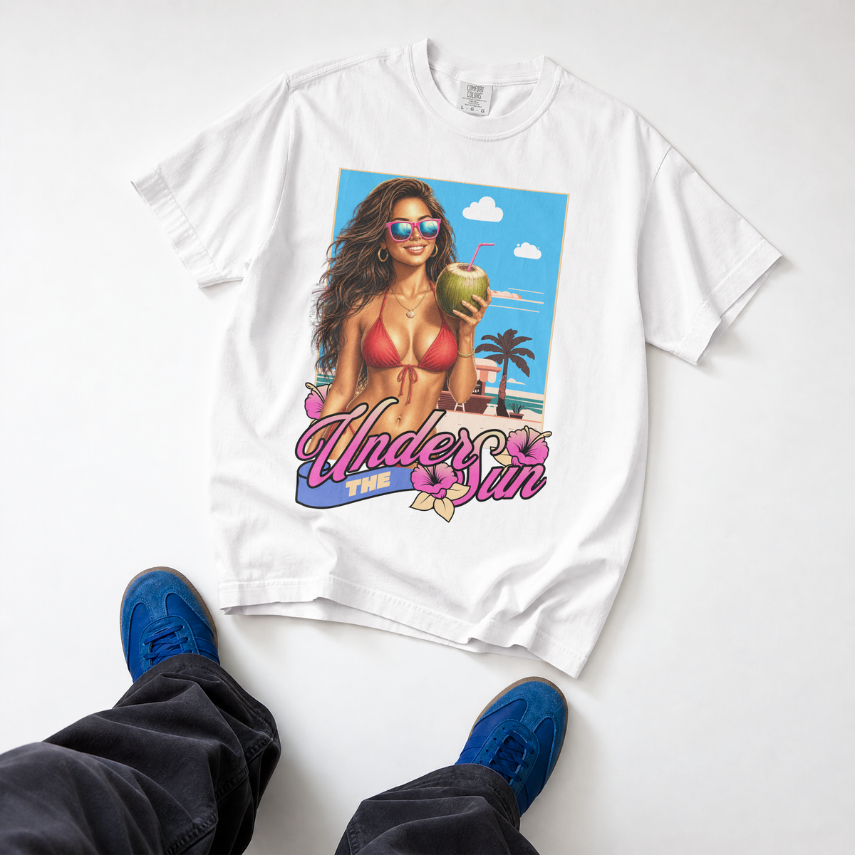 Front view of a white premium cotton t-shirt with a tropical beach girl in red bikini and hibiscus flowers artwork