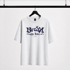 "White streetwear oversized t-shirt with Break The Rules gothic lettering"