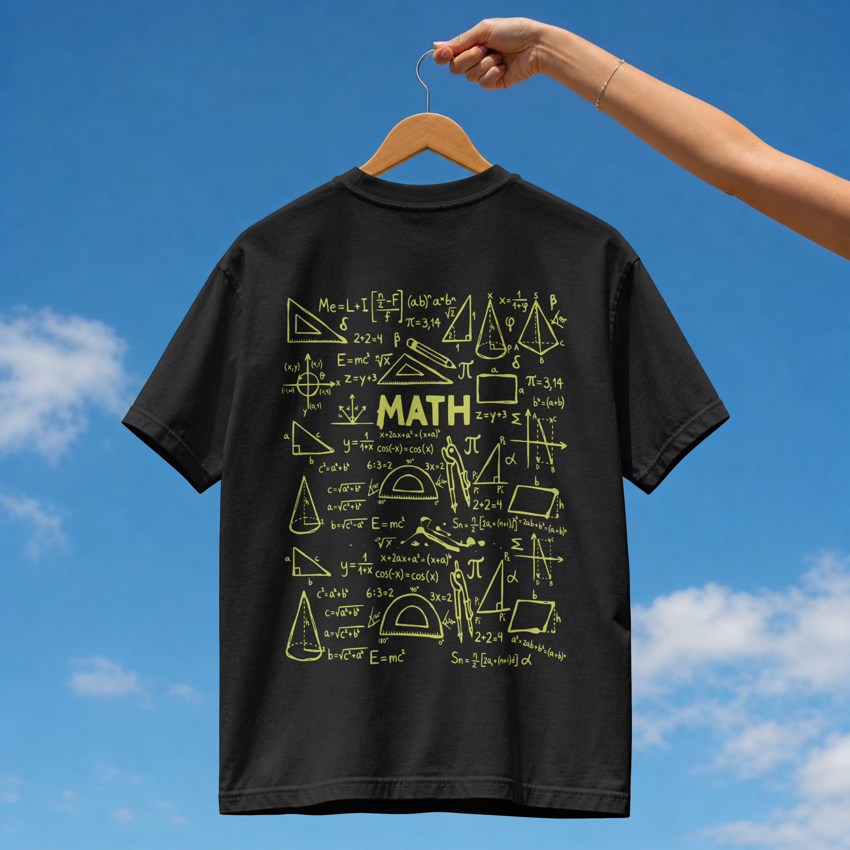 Back view of a dark streetwear t-shirt featuring a detailed white chalkboard illustration of math equations, formulas, and geometry shapes
