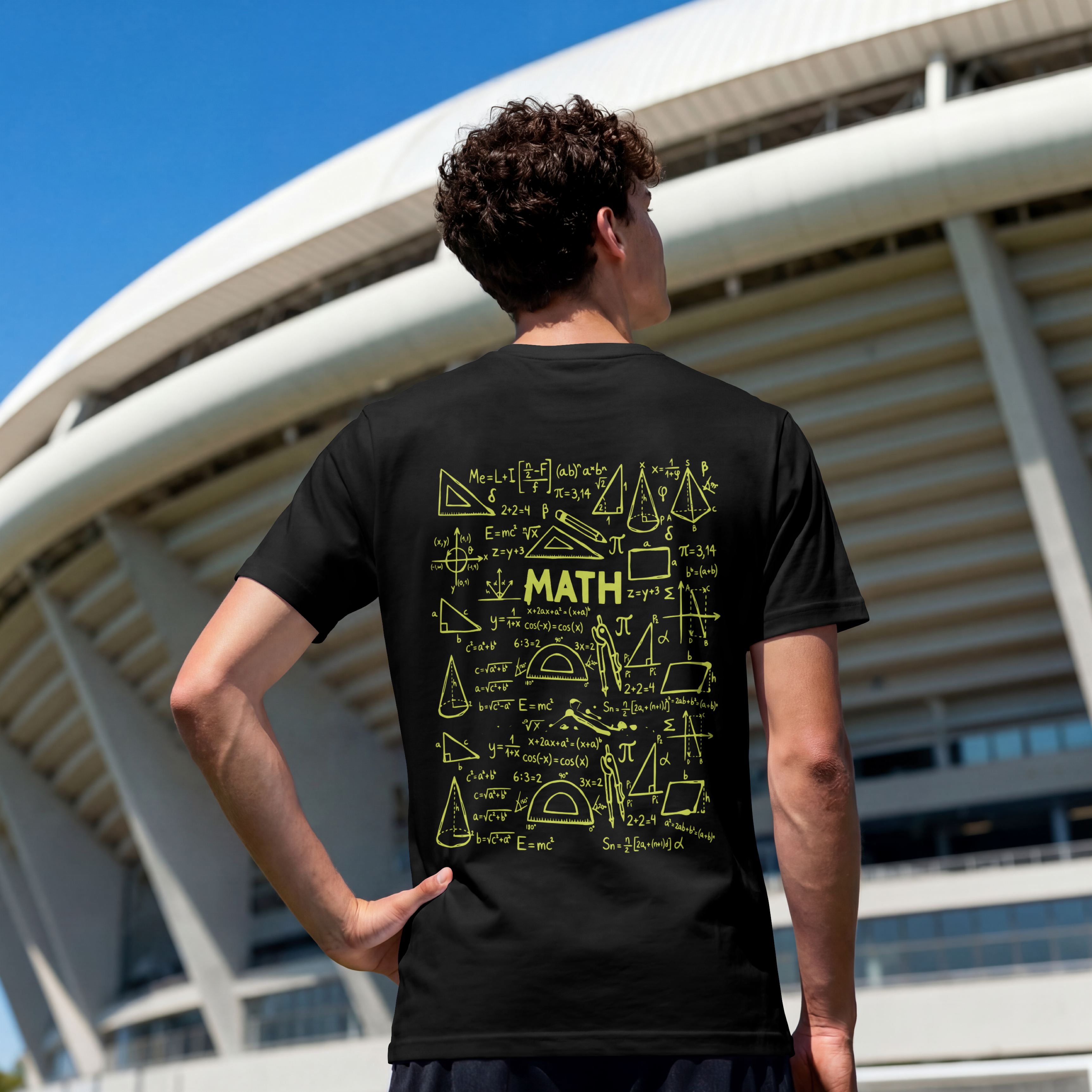 Back view of a dark streetwear t-shirt featuring a detailed white chalkboard illustration of math equations, formulas, and geometry shapes