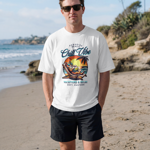 A crisp white relaxed fit streetwear t-shirt with a colorful Paradise Beach sunset and a cat sipping coconut drink