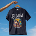 Model wearing a navy premium cotton t-shirt with a vintage white Sunday in Paradise slogan and a colorful chilling beach monkey illustration