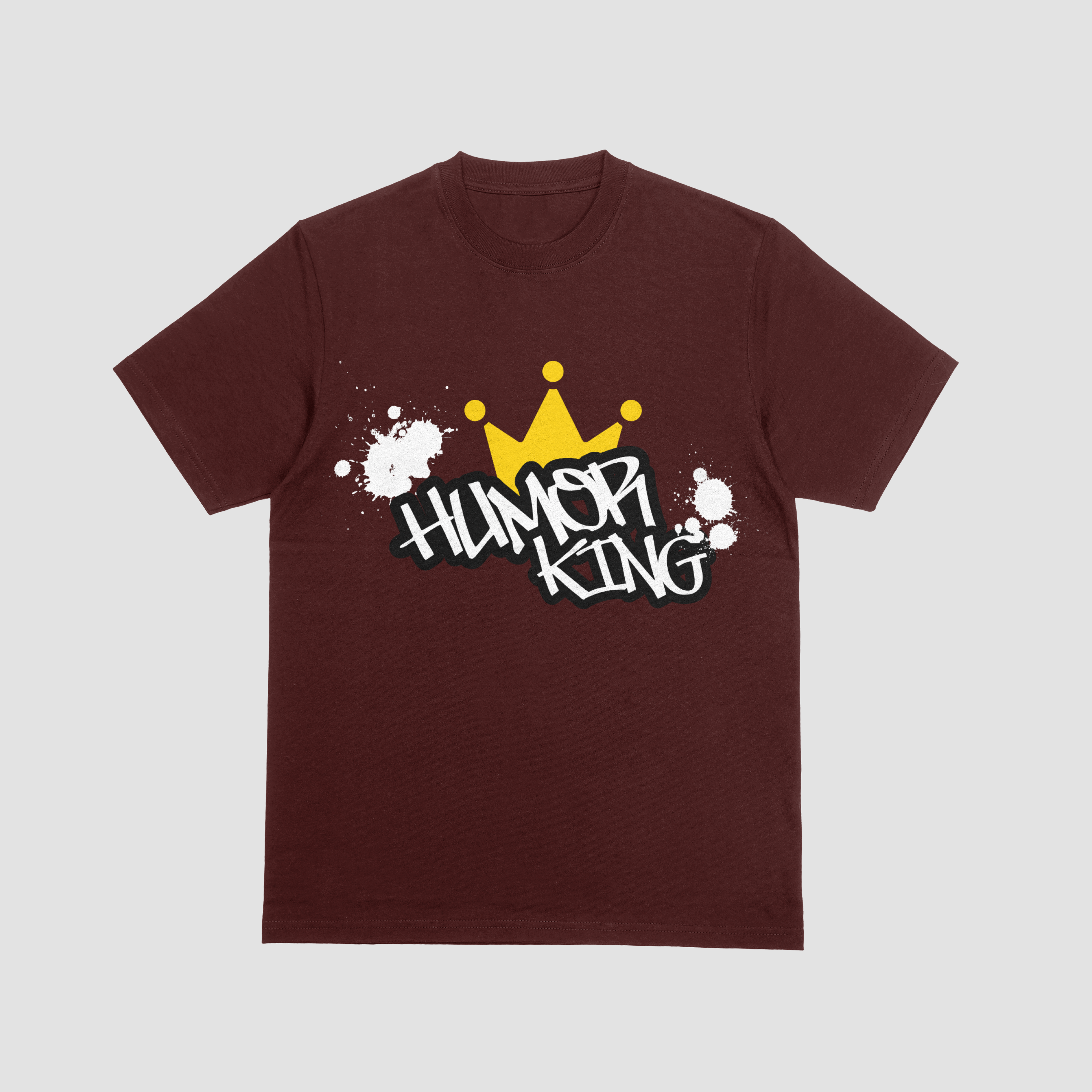 Model wearing a maroon premium cotton t-shirt with a bold white Humor King graffiti font and yellow crown graphic